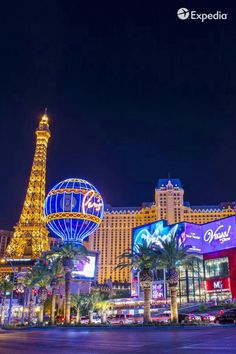 the eiffel tower is lit up at night in las vegas, nv