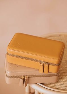 Beautiful jewelry deserves beautiful storage. You (probably) can’t wear every piece you own at once. 😉 Keep your favorite unworn pieces tucked away in our custom jewelry storage case. It’s as pretty as it is functional. High-quality vegan leather with a soft microfiber lining. Zipper closures with gold hardware. Measures 8.5 x 5 x 3" Features: Removable embossed double-sided zipper pouch for bracelets and earrings Snap-out tab with holes for six pairs of earrings Snap-out ring bar Embossed inte Target Jewelry Travel Case, Elegant Portable Rectangular Jewelry Case, Elegant Portable Rectangular Jewelry Storage Case, Travel Jewelry Storage Rectangular Case, Luxury Rectangular Travel Jewelry Storage Case, Copper Uses, Everyday Wear Jewelry, Beautiful Storage, Travel Jewelry Case