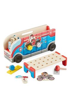 a toy fire truck with tools and accessories for it's play set on a white background