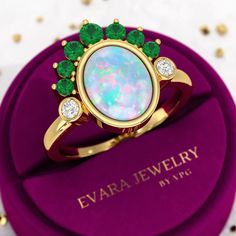 Discover the timeless elegance of our Vintage Statement Ring, featuring opal, natural emerald, and lab grown CVD diamond. This unique piece of handmade fine jewelry captures the essence of sophistication and artistry. Perfect as a personalized gift for her, this ring adds a touch of luxury to any collection. Meticulously crafted, it is designed to be both a statement of style and a cherished keepsake, ideal for special occasions and everyday elegance. 𝐅𝐞𝐚𝐭𝐮𝐫𝐞𝐬: * 𝐌𝐚𝐝𝐞 𝐭𝐨 𝐎𝐫𝐝𝐞𝐫 Crown Theme, Statement Rings Unique, Stacked Wedding Rings, Statement Rings Diamond, Everyday Elegance, Cvd Diamond, Handmade Fine Jewelry, 18k Gold Ring, Deco Ring