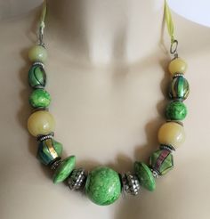 beaded necklace interesting collection of chunky plastic green and cream beads Shipped free with any other item in the UK Vintage Green Glass, Green Beads, Necklace Beaded, Lovely Necklace, Black Necklace, Beaded Necklaces, Cuff Bangles, Green Bead, Brown Beige