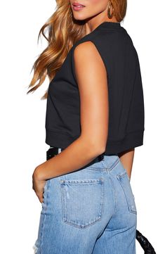 Get the comfort of a sweatshirt and the modern style of your favorite cropped looks in this sleeveless layer cast in versatile black. Crewneck Sleeveless 100% polyester Hand wash, dry flat Imported Trendy Sleeveless Crop Top For Layering, Athleisure Crop Top For Layering, Versatile Black Crew Neck Crop Top, Casual Black Cropped Hem Top, Black Stretch Cropped Top, Stretch Black Cropped Tops, Trendy Cropped Muscle Tee For Spring, Cropped Vest Top For Fall, Black Crew Neck Vest For Spring