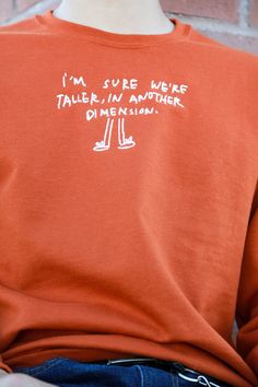 ✰I'm Sure We're Taller in Another Dimension✰UNISEX✰Hand drawn and designed✰Embroidered sweatshirt✰Super soft and comfy!✰Ships within anywhere from 1 day-6 weeks ✰Model is 5'8 and wearing Size L Swwatshirt Ocean Embroidery, Clothes Alterations, Graphic Shirt Design, Orange Tees, Embroidery Hoodie, Another Dimension, Cute Hoodie, Altering Clothes, Aesthetic Shirts