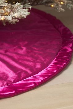 a christmas tree skirt on top of a table