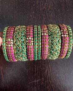 Enhance your beauty with handmade Bridal jewelery. VClassy gives a perfect Silk thread and Kundan design bangles for all your special occasions. It's a perfect gifting option for wedding, housewarming ceremony, baby shower, return gift.  We provide a wide range of Silk thread jewellery in different categories in attractive colors and design with finest finishing. Handmade Kundan Silk Thread Bangle | Indian Jewelry - 2 Set Pink & Green (Each set has 5 bangles - 1 Grand middle bangle, 2 broad bang Kundan Thread Bangles, Kundan Design, Silk Thread Necklace, Silk Thread Bangles Design, Thread Bangles Design, Maggam Work Designs, Bridal Jewelery, Kundan Bangles, Thread Necklace