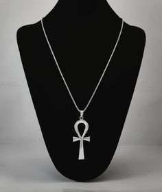 GET A FREE GIFT BOX WHEN YOUR ORDER OF 100$ OR MORE.PLEASE NOTE, ORDERS PROCESS TIME IS 3-5 DAYS.- Material: Our handmade ankh necklace is crafted using premium-grade Sterling silver.- Size: The charming Egyptian ankh pendant measures 67×25mm - Finish: This gold ankh bracelet comes with a high polished and black oxidized finish.The Royal Ankh features a stunning handcrafted ancient ankh symbol. The revival necklace is designed to help add a piece that assists you in harnessing the cultural power Silver Ankh Necklace For Ceremonial Use, Silver Ankh Necklace For Ceremonial Occasions, Ceremonial Cross Necklace In Spiritual Style, Silver Ankh Symbolic Necklace, Ceremonial Ankh Amulet Necklace, Spiritual Ankh Necklace For Ceremonial Use, Traditional Ankh Necklace For Gifts, Silver Ankh Amulet Necklace, Traditional Silver Ankh Jewelry