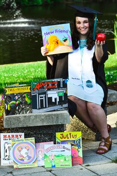 a woman sitting on a bench with books and an apple in front of her,