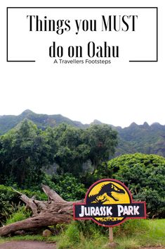 there is a sign that says things to do in oahuu with trees and mountains in the background