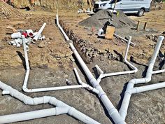 pipes are laid out on the ground in preparation for installation