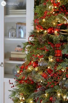 a decorated christmas tree with red and green ornaments