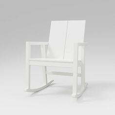 a white rocking chair on a grey background