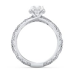 a white gold engagement ring with an intricate design on the shan shan shan shan shan shan shan