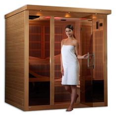 a woman in a saunas with the door open