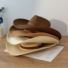 Discover the Perfect Blend of Style and Functionality Step out in style this summer with our New Design Natural Paper Western Cowboy Hat. Whether you're heading to the beach, a music festival, or just enjoying a sunny day outdoors, this hat is your ultimate accessory. Crafted with a blend of natural paper and polyester, it offers a lightweight and breathable fit, making it ideal for warm weather. Versatile and Unisex This cowboy hat is designed for both men and women, offering a unisex appeal that fits seamlessly into any wardrobe. Its solid pattern and casual style make it a versatile piece that complements any outfit, whether you're going for a laid-back beach look or a more polished summer ensemble. Key Features Material: Natural paper and polyester for a lightweight, breathable feel. B Chapeau Cowboy, Natural Paper, Western Cowboy Hats, Sun Hats For Women, Cowboy Style, Summer Patterns, Beach Look, Cowboy Hat, Western Cowboy