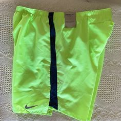 Neon Yellow/Green Nike 7” Running Shorts New With Tags Size Large Yellow Athletic Shorts With Built-in Shorts For Spring, Neon Yellow Sports Shorts, Nike Green Athletic Shorts With Built-in Liner, Nike Yellow Workout Shorts, Green Nike Shorts For The Beach, Nike Green Shorts For Spring, Neon Yellow Sports Shorts For Summer, Nike Green Athletic Shorts For Spring, Yellow Athletic Shorts For Sports In Spring