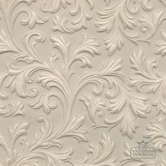 an ornate wallpaper pattern with white flowers and leaves on the side, in shades of beige