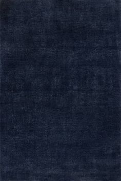 an area rug with dark blue colors