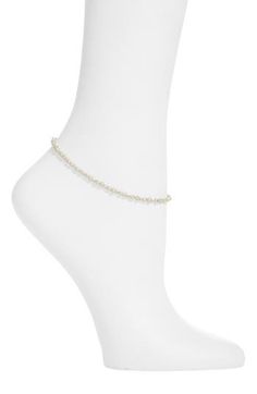 A luminous mix of freshwater rice pearls, potato pearls and nugget pearls form this irresistibly lustrous anklet ready to be seen on warm-weather days. 9 1/4" length; 1 1/2" extender Pearl size: 1–5.5mm Freshwater pearl/14k-gold fill Made in the USA Adjustable White Pearl Chain Anklet, Elegant White Anklets With Pearl Chain, Elegant Pearl Beaded Anklets, Elegant White Pearl Chain Anklets, Dainty White Wedding Anklets, Rice Pearls, Pearl Anklet, Weather Day, Anklet Jewelry