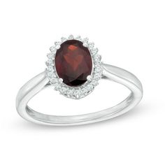 Chic and simple, this dazzling gemstone ring is an exquisite keepsake for the January birthday girl. Crafted in cool 10K white gold, this distinctive look features an 8.0 x 6.0mm oval-shaped regal red garnet surrounded by a luminous frame of lab-created white sapphires. Below, shimmering filigree designs lend dimension to choice, while a gently pinched shank completes the style. Beautiful with a brilliant buffed luster, this ring reminds her just how much you adore her. Zales Engagement Rings, Zales Zales, Garnet And Diamond Ring, Frame Ring, January Birthday, Filigree Pattern, Garnet Stone, Filigree Design, Sapphire Stone