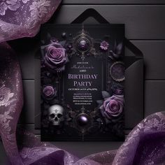 a black and purple birthday party with roses, skulls and lace on the table next to it