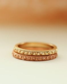 Cherished Gold Ring
With a delicate confetti beaded pattern surrounding the entire band, she's a reminder you're cherished. You cherish those you love most.  Beautiful crafted stacking ring perfectly pairs with other Erin Pelicano rings, or as a band worn in her own beauty. Stack one for each child, stack one for each of your favorite people, collect one for each milestone, or wear as your wedding band.

Designed and crafted in solid 14k gold, choose from white, yellow, or rose gold.

 	14k Delicate Stackable Band For Promise Ring, Heirloom Halo Stackable Rings For Promise, Heirloom Style Stackable Midi Rings For Wedding, Heirloom Stackable Midi Rings For Wedding, Heirloom Style Stackable Eternity Band, Heirloom Style Stackable Round Eternity Band, Heirloom Style Stackable Wedding Midi Rings, Heirloom Stackable Round Eternity Band, Heirloom Stackable Wedding Midi Rings