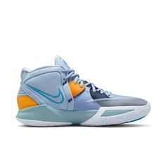 the nike zoom basketball shoe is shown in blue, yellow and white with orange accents