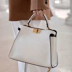 Buy White Leather Top Handle Middle-Size Satchel Metal Lock Shoulder Bags Worldwide Free shipping and return, color: White , material: Genuine Leather Structured Bag Classy, White Hand Bag, White Leather Bag, Fendi Peekaboo, Bag Women Fashion, Elegant Bags, Stylish Handbags, White Handbag, Leather Handbags Women