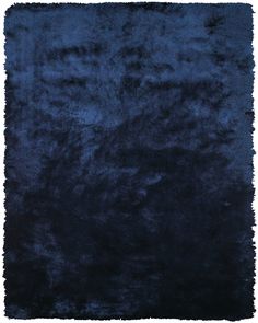 a dark blue area rug on a white background