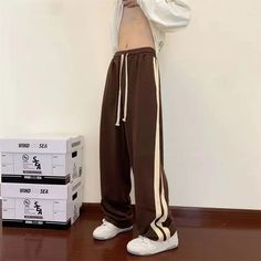 Threebooy Sports Pants for Men in Spring Summer New Striped Patchwork Loose Drawstring All-match Straight Pants Trend Casual Men Clothing Material: POLYESTER Applicable Scene: Daily Pant Style: STRAIGHT Style: Casual Model Number: 5ty Thickness: midweight Waist Type: high modname=ckeditor Sporty Brown Pants, Sporty Brown Sports Pants, Brown Full-length Sports Pants, Sporty Brown Pants For Gym, Brown Full Length Sports Pants, Brown Full Length Pants For Sports, Pants Trend, Pant Trends, Mens Pants Fashion