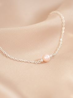 Pink freshwater pearl bracelet, silver cable chain and details. Elegant, great for daily use or for a special occasion.  Perfect as gift for a loved one or a lovely treat for yourself! Comes with a pink velvet pouch. 🌸This bracelet is: - Hypoallergenic - Handmade   - The size of the pearls is of approximately 5 mm. - Bracelet length can be of 14cm, 15 cm, 16cm, 17cm, 18 cm. Please choose your size from the options below. You can use our picture as reference on how to measure your wrist.   - Ext Dainty Pearl Bracelet With Pendant As Gift, Delicate Pearl Pendant Bracelet As Gift, Feminine Pearl Bracelet For Gift, Feminine Pearl Bracelet Gift, Feminine Pearl Bracelet For Gifting, Feminine Pearl Bracelets As Gift, Sterling Silver Pearl Bracelet As Gift, Pink Pearl Drop Bracelet As Gift, Delicate Pink Pearl Bracelet As A Gift