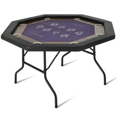 a black table with purple cloth on the top and four holes in the middle that have butterflies on them