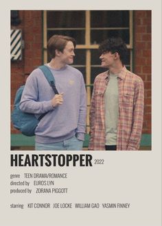 two men standing next to each other in front of a brick building with the words heartstopper on it