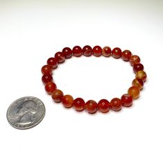 Carnelian Beaded Bracelet You will receive 1 (ONE) Carnelian Beaded Bracelet similar to the item pictured Available in 6mm 8mm 10mm FOLLOW US ON INSTAGRAM @earthsmineralsinc Thank you ! Pictures and colors Please note that visual representation of our products, especially colors, may appear a little different due to lighting in the photographic process. Shopper's computer screens may also affect appearance and colors. If a product is received that appears different from the item ordered, please Carnelian 8mm Beads Jewelry, Beaded Round Carnelian Bracelets, Orange Round Carnelian Beaded Bracelets, Red Carnelian Round Beads Bracelet, Carnelian Round Beads, Thank You Pictures, Carnelian Crystal, Carnelian Pendant, Carnelian Beads