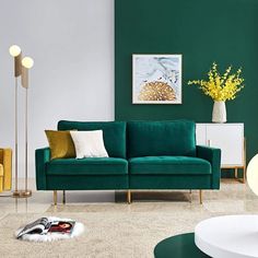 a living room with green walls and white rugs on the floor, two yellow chairs