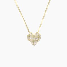 This stunning necklace features a modern heart design that is perfect for any occasion. The necklace is plated in luxurious gold over sterling silver and adorned with sparkling cubic zirconia stones that add a touch of glamour and elegance. With its 16"+2" length, this necklace is sure to make a statement and elevate any outfit. Elegant Cubic Zirconia Rhinestone Necklace For Valentine's Day, Gold Crystal Rhinestone Necklace For Valentine's Day, Valentine's Day Gold Crystal Rhinestone Necklace, Valentine's Day Gold Rhinestone Necklace, Gold Heart Pendant Necklace With Rhinestones, Heart-shaped Cubic Zirconia Rhinestone Necklace As Gift, Gift Heart-shaped Cubic Zirconia Rhinestone Necklace, Elegant Heart-shaped Cubic Zirconia Rhinestone Necklace, Gold Heart Pendant Rhinestone Necklace Gift