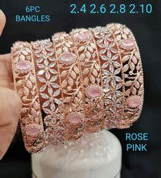 This piece of bangles with rose gold polish looks so beautiful with every dress you wear. This Trendy bangles Go With Everything In Your Closet, From Your Day-To-Day Office Attire to any Special Occasions. Perfectly fit for you to attend any special occasions such as dinner party, birthday party, wedding, festival celebration, graduation, concert, anniversary, dancing ball, baby shower, beach fun, prom, formal events and so on, even everyday wear. What u see is what u get! If you have any questi Ruby Bangles Indian, Gold Bangles Set, Rose Gold Bangles, Ruby Bangles, Gold Bangle Set, Diamond Baguette, Silk Thread Bangles, Bangles Set, Rose Gold Bangle