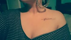 a woman with a small tattoo on her chest