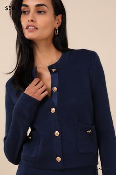 From the sweetest on campus to the cutest at brunch, the Lulus Most Adorable Vibes Navy Blue Button-Front Cardigan Sweater Top always does the trick! Cozy sweater knit shapes this cardigan top with a crew neckline and long sleeves. The slightly cropped bodice boasts a functional, gold embossed button placket at the center and two patch pockets with matching decorative buttons. Ribbed knit accents the neckline, cuffs, pockets, and hem. Pair with the matching skirt for a complete look! Fit: This garment fits true to size. Length: Size medium measures 19" from shoulder to hem. Bust: Great for any cup size. Waist: Loosely Fitted. Fabric: Fabric is very stretchy. Unlined. 100% Acrylic. Hand Wash Cold. Do Not Bleach. Line Dry. Iron Low Heat. Imported. Lulus | Most Adorable Vibes Navy Blue Button Casual Formal Dresses, Navy Blue Cardigan, Navy Cardigan, Navy Blue Sweater, Lulu Fashion, Button Front Cardigan, Decorative Buttons, Cardigan Top, Cozy Sweater