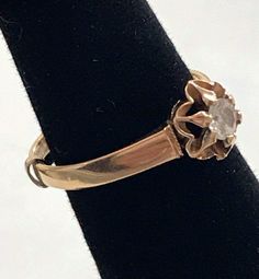 Vintage 14K Yellow Gold 1/4 CT ROUND DIAMOND Flower Engagement Ring Beautiful! Gorgeous ring! * Crafted in solid 14K yellow gold, the ROUND cut center diamond is approximately .25ct. G/H color. * Very pretty ring! * 2.3 grams * Size 6.75 with sizer (there is a sizer in ring band)  * Will ship Insured Yellow Gold Flower Ring With Single Diamond, Classic 14k Gold Flower Ring With Rose Cut Diamonds, Classic 14k Stamped Yellow Gold Flower Ring, Yellow Gold Solitaire Diamond Flower Ring, 14k Gold Flower Ring With Diamond Accents, Gold Flower Ring With Rose Cut Diamonds, Heirloom 14k Gold Flower Ring, Heirloom Style 14k Gold Flower Ring, Classic 14k Stamped Flower Ring For Anniversary