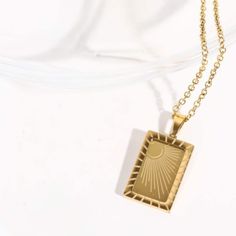 This stainless steel 18K gold-plated necklace is a great accessory for the modern minimalist who wants a subtle reminder their highest aspirations. This is not precious jewelry, so it's good for everyday wear, but each piece is plated with 18K gold so you can elevate your everyday look. "Which truth shineth. This is the light of Christ. As also he is in the sun, and the light of the sun, and the power thereof by which it was made." -- Doctrine and Covenants 88:7 Product measurements Chain length: 16.1 in Extension chain length: 2 in Pendant height: 0.75 in (1.9 cm) Pendant width: 0.5 in (1.2 cm) Weight: 0.2 oz (6 g) Note: Avoid wearing during exercise, as sweat will react with the jewelry to produce silver chloride and copper sulfide, which causes the jewelry to break down and corrode over Everyday Gold-colored Stainless Steel Necklace, Modern Gold Stainless Steel Necklace, Minimalist Stainless Steel Rectangular Pendant Necklace, Gold Square Pendant Stainless Steel Jewelry, Gold Square Pendant Jewelry In Stainless Steel, Gold Stainless Steel Square Pendant Jewelry, Minimalist Stainless Steel Square Pendant Necklace, Minimalist Brass Necklace With Rectangular Pendant, Gold Stainless Steel Necklace With Rectangular Pendant