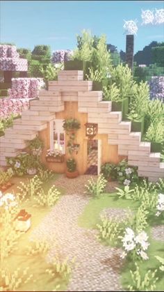 a house made out of blocks and plants