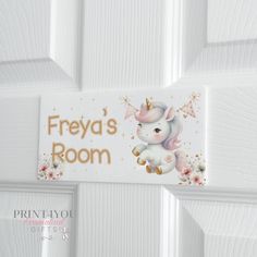 a white door with a sign that says freva's room and a unicorn on it