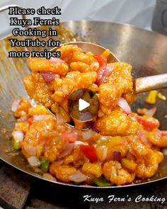 a pan filled with food on top of a stove