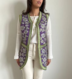 Vintage afghan waistcoat with embroided flowers in size S-M Sleeveless Outerwear With Floral Embroidery For Spring, Sleeveless Spring Outerwear With Floral Embroidery, Sleeveless Floral Embroidery Spring Outerwear, Sleeveless Floral Embroidered Spring Outerwear, Festive Bohemian Vest With Floral Embroidery, Bohemian Sleeveless Embroidered Outerwear, Fitted Vest With Floral Embroidery For Festive Season, Festive Fitted Vest With Floral Embroidery, Fitted Sleeveless Outerwear With Floral Embroidery