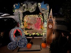 an outdoor stage set up with pumpkins and decorations