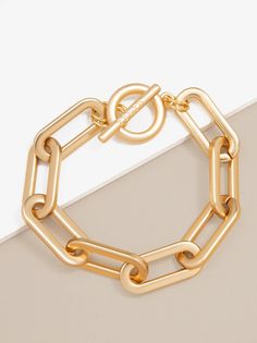 Classic glam with a striking polished finish, this bracelet is both charming and versatile. Perfect as an everyday staple or paired with other metal styles. Classic Glam, Meet The Maker, Elevated Fashion, Jewelry Design Inspiration, Toggle Bracelet, The Maker, Timeless Treasures, Metal Style, Matte Gold