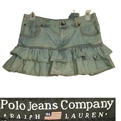 Polo By Ralph Lauren Denim Ruffle Mini Skirt Button & Zipper Fly Closure 3 Front Pockets Belt Loops Back Yoke Riveted Front Pockets Light Wash 100% Cotton Size 31 Waist: 17 Inches Hips: 20 Inches Length (Measured At Side Seam): 13.5 Inches New W/Tags Questions? Leave A Comment Below Or Bundle And Comment In The Bundle! Offers Welcome; The Worst I Can Do Is Decline, But I Will Always Accept Or Counter Reasonable Offers. #'S 2022 Trend, Jean, Summer, Micro, Denim, Great For Layering, Nwt, Preppy, Ruffled Denim Skirt, Ruffle Denim Skirt, Y2k Dark Academia, Y2k Denim Skirt, Pretty Fits, Pinterest Wardrobe, Outfit Pieces, Distressed Skirt, Diy Jeans