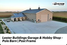 an aerial view of a large garage and shop in the middle of a farm field