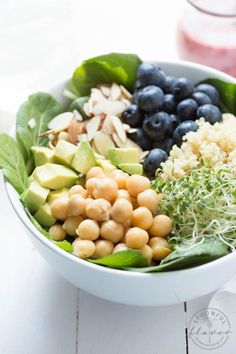 a white bowl filled with different types of food