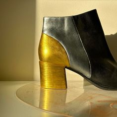 Vintage Leather Ankle Boots With Square Toe. Heel And Back Panel Have Been Given A Disco Re-Vamp With Gold And Silver Paint. Heel Is Gold On The Outside And Silver On The Underside For A Pop Of Surprise. Seen On A 5’3” Size 5.5/6 Human. Labeled A Size 9 Heel Height 2&1/4” Metallic Leather Heeled Boots With Pointed Toe, Metallic Leather Boots For Formal Occasions, Formal Metallic Leather Boots, Metallic High Heel Leather Boots, Silver Heeled Boots With Round Toe For Formal Occasions, Metallic Leather Boots With Round Toe, Metallic Leather Boots For Evening, Silver Leather Heeled Boots For Formal Occasions, Formal Silver Leather Heeled Boots